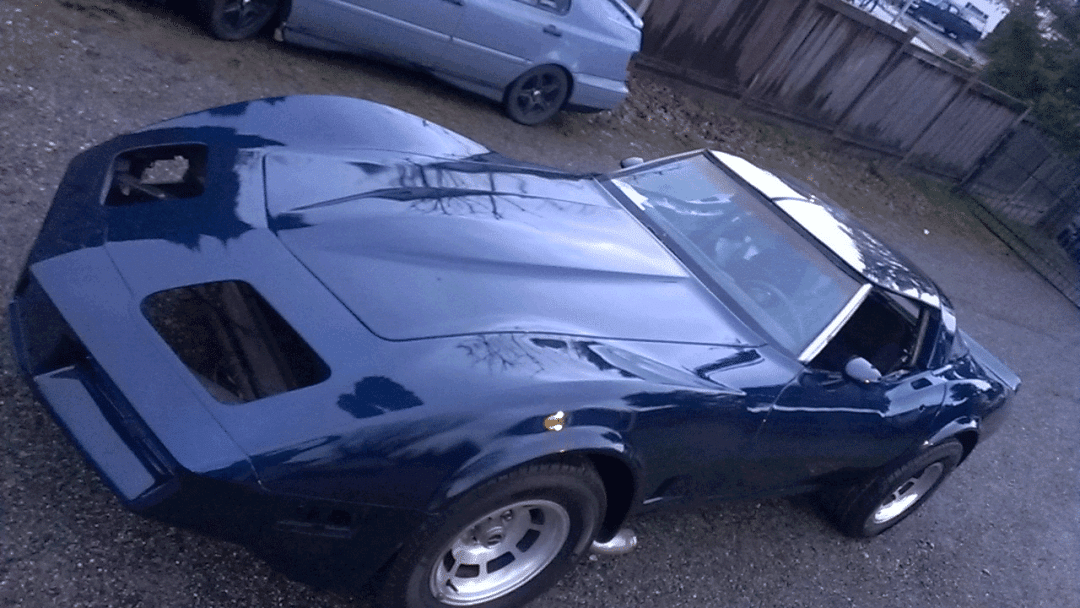 Electric Blue Corvette painted over black base coat. True Custom Paint.