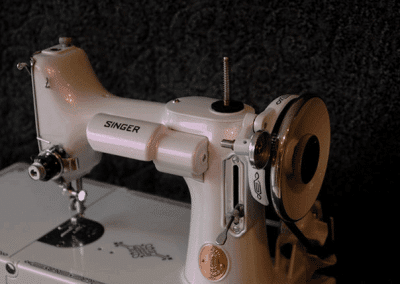 Singer sewing machine with violet paint ghost pearl