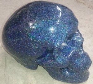 Holographic blue custom paint job on a skull.