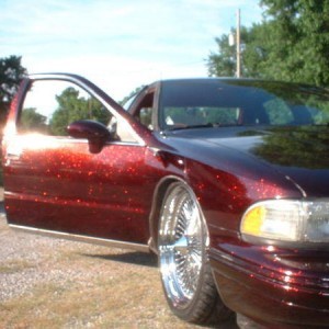 Customer Painted a Caprice with Fire Red and Happy with results.