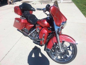 Wine red candy crystal on electra glide.